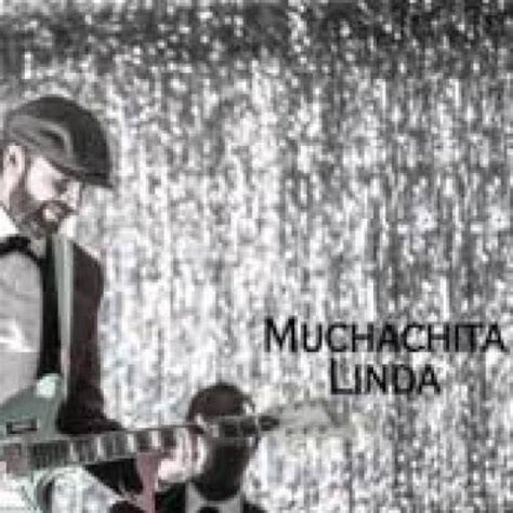 Lyrics & Translations of Muchachita Linda by Juan Luis Guerra ·