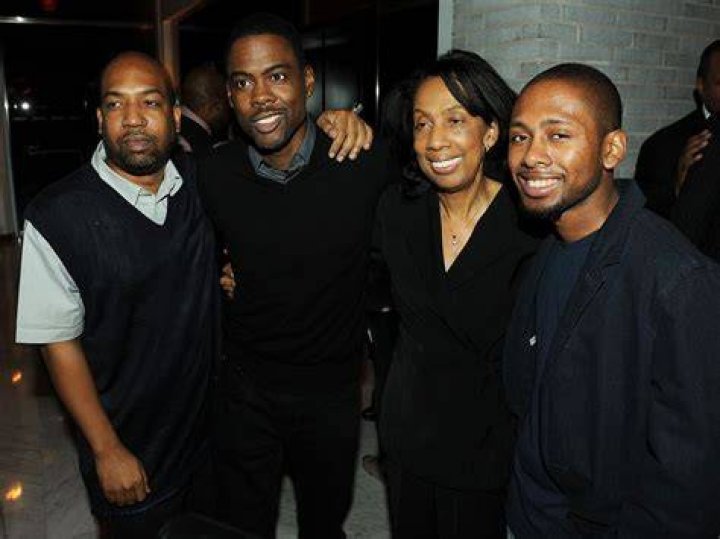 Which of Chris Rock's siblings died?